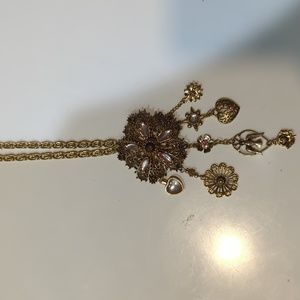 Women's necklace with charms